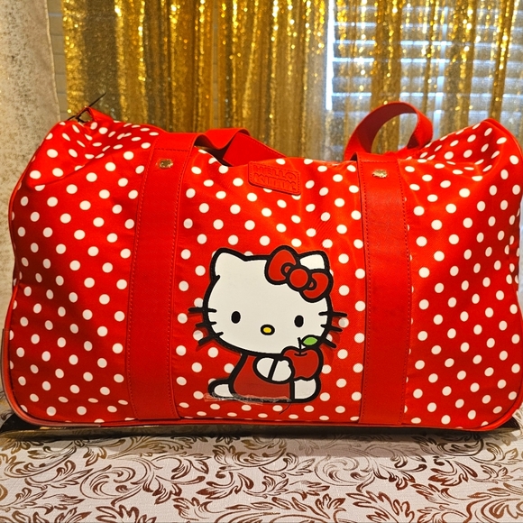 Bioworld Hello Kitty Rolling Duffle bag with pull handle Luggage 20 Inch Sanrio - Picture 1 of 10